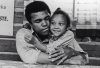 Mohammad Ali with his daughter - best quotes about children