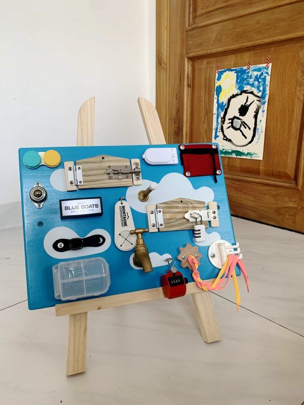 how to use easel as a stand for busy board indoors