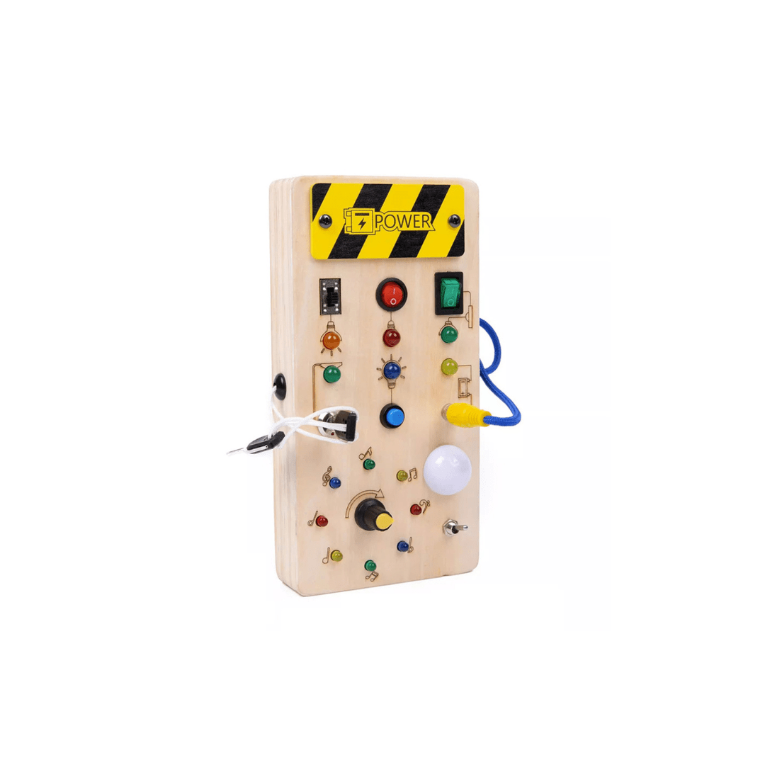 small busy board with switches and colored lights